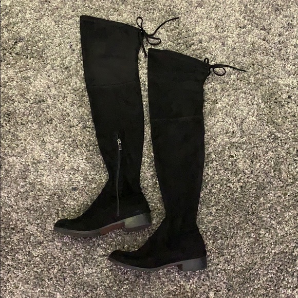 skin tight black knee high boots